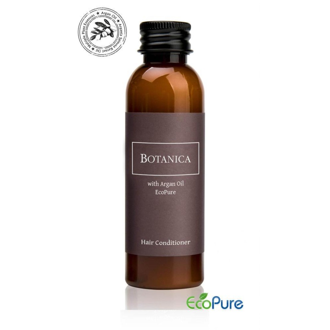 Botanica hotel hair conditioner in a sleek brown bottle of 60ml, formulated with argan oil, and Eco pure. A premium part of the BOTANICA hotel toiletries collection, offering guests natural and indulgent hotel amenities.