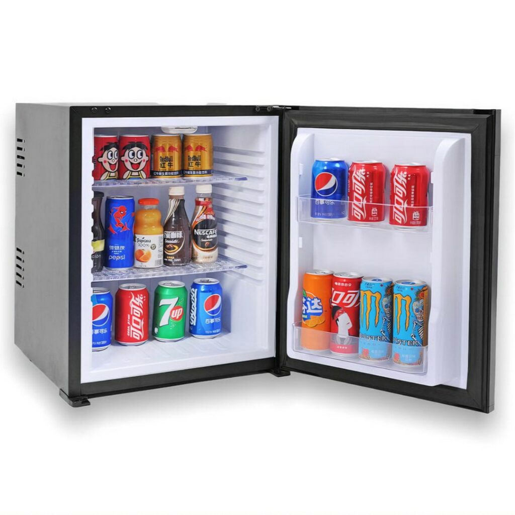 Hotel room minibar fridge, 40 liters, black color, thermoelectric, stocked with assorted beverages, including soft drinks, and energy drinks. A perfect hotel room appliance for guest comfort and convenient access to refreshments, enhancing overall hotel amenities.