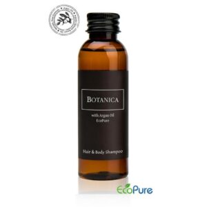 Botanica hotel shampoo for hair and body in a sleek brown bottle of 60ml, formulated with argan oil, and Eco pure. A premium part of the BOTANICA hotel toiletries collection, offering guests natural and indulgent hotel amenities.