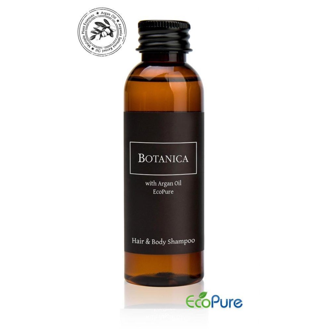 Botanica hotel shampoo for hair and body in a sleek brown bottle of 60ml, formulated with argan oil, and Eco pure. A premium part of the BOTANICA hotel toiletries collection, offering guests natural and indulgent hotel amenities.