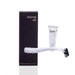 Hotel shaving set with disposable razor and mini shaving cream tube, part of premium hotel amenities and guest accessories collection.