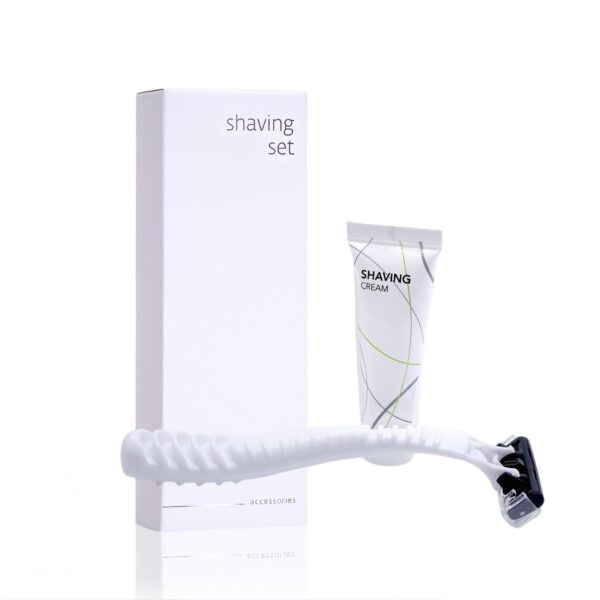 White shaving set with disposable razor and mini shaving cream tube, part of premium hotel amenities and guest accessories collection