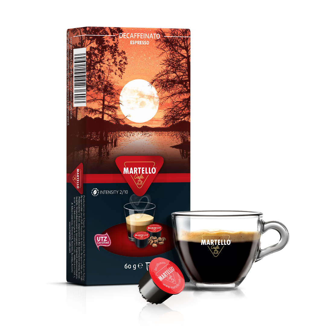 Pack of Martello decaffeinated coffee with 10 pods with a clear espresso cup and decaf coffee pod in front, showcasing rich espresso coffee. Perfect hotel coffee capsules and coffee pods for smooth, aromatic coffee experiences.