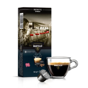 Pack of Martello Ristretto espresso coffee 10 pods capsules with a clear espresso cup and coffee pod in front, showcasing rich crema. Perfect hotel coffee capsules and coffee pods for smooth, aromatic coffee experiences.